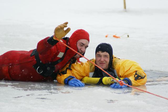 Saranac Lake Paid Driver Rick Hurteau rescues his victim from the icy water!!!&quot;Lifeguard Systems, Surface Ice Rescue Training 1/8/2012&quot;